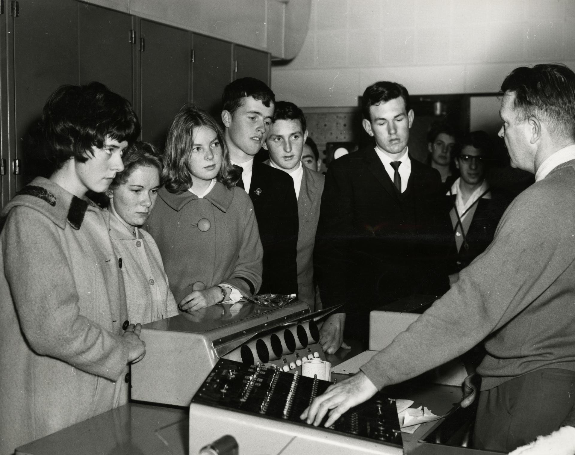 Secondary School students examine computer equipment, Open day 1963