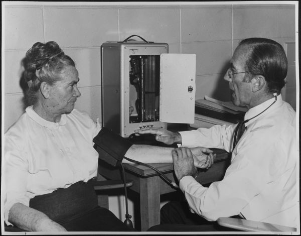 Photograph of Prof R. R. H. Lovell with patient, 22 November 1972, University of Melbourne. Media and Publication Services Office, 2003.0003.00486