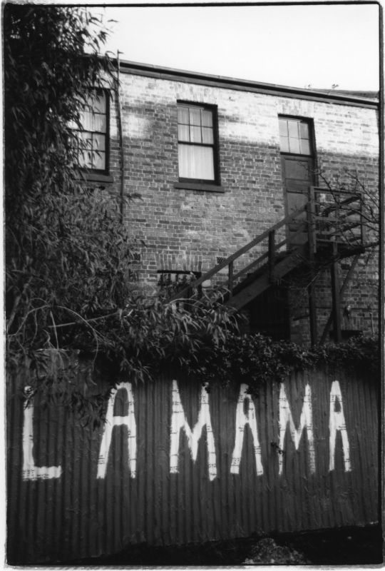 La Mama painted on fence outside La Mama theatre