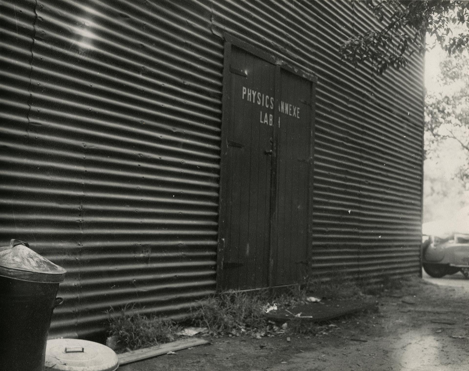 Corrugated iron shed housing Physics Annexe laboratory, 1958