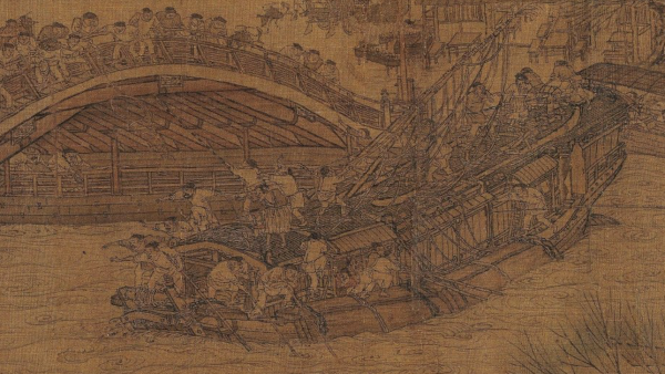 Detail of aged Chinese scroll depicting numerous figures on and hear a bridge in regionnal area.