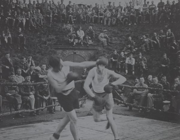 Australian Red Cross Society – National Office, Photographs (2016.0081), Unidentified prisoners of war camp: boxing match watched by large crowd of men, Lantern Slide, (2016.0081.00045)       